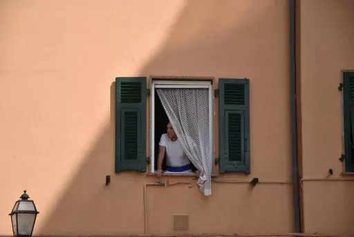 Man at Window in Italy